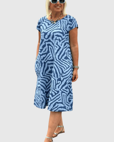 Nelia | Letní šaty s kulatým výstřihem a krásným potiskem